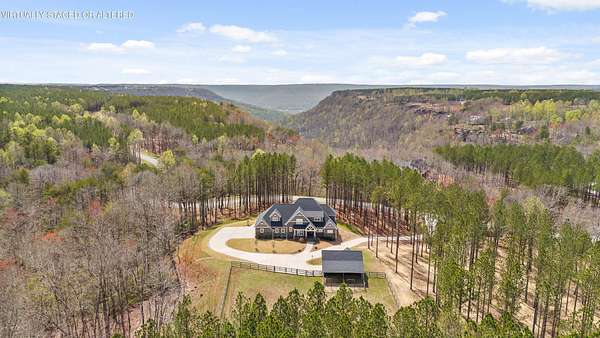 9.39 Acres of Land with Home for Sale in Jasper, Tennessee
