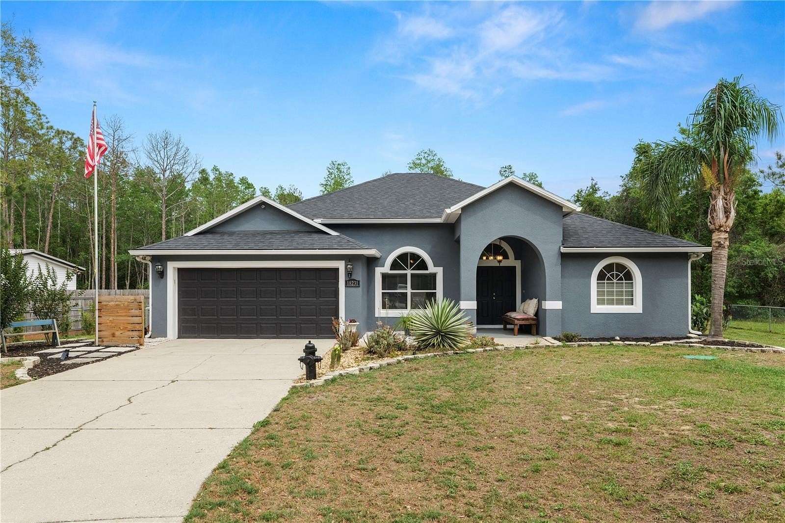 5 Acres of Residential Land with Home for Sale in Polk City, Florida