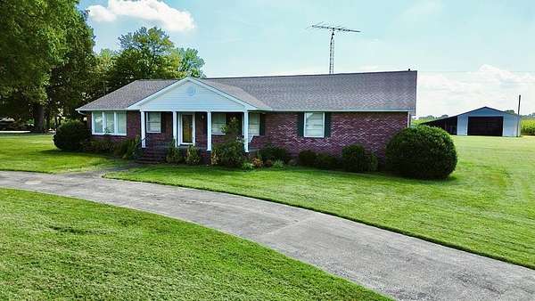 1.5 Acres of Residential Land with Home for Sale in Sharon, Tennessee