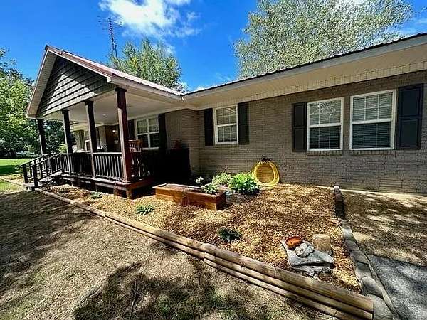 2 Acres of Residential Land with Home for Sale in Camden, Tennessee