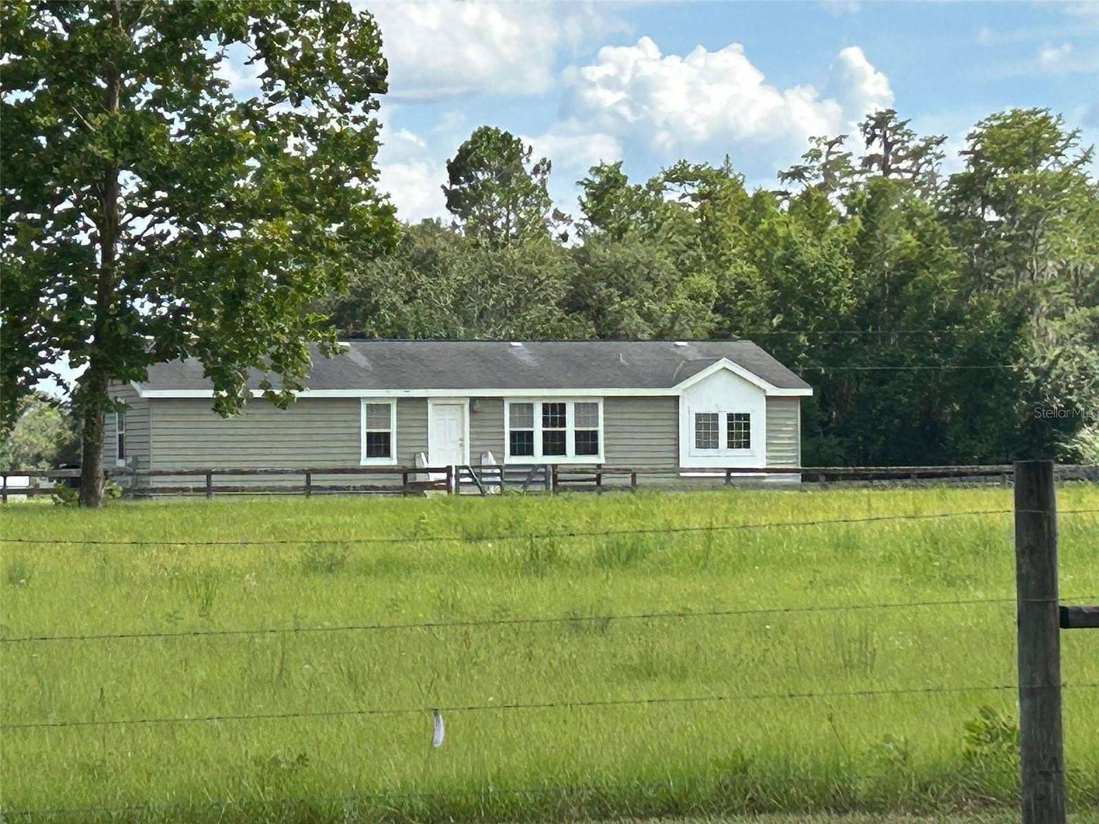 5.54 Acres of Land with Home for Sale in Lake Butler, Florida