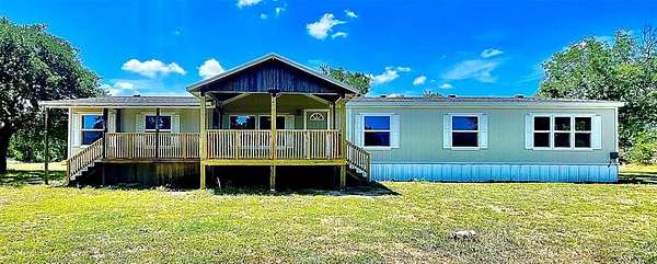 2 Acres of Residential Land with Home for Sale in Granbury, Texas