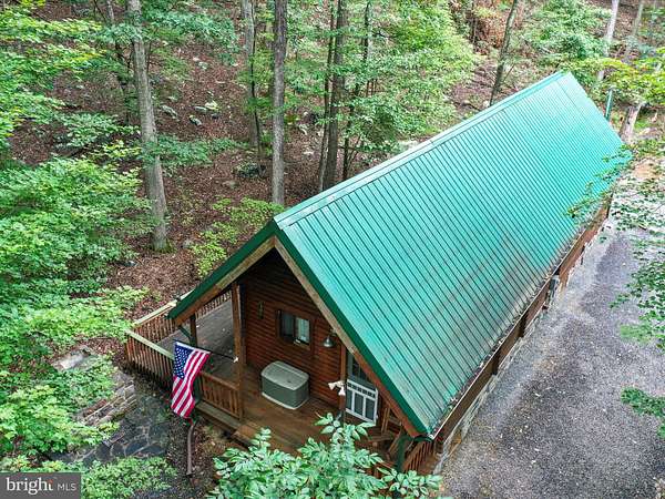 2.19 Acres of Residential Land with Home for Sale in Great Cacapon, West Virginia