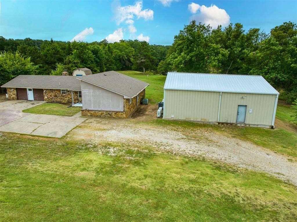 5 Acres of Residential Land with Home for Sale in Prague, Oklahoma