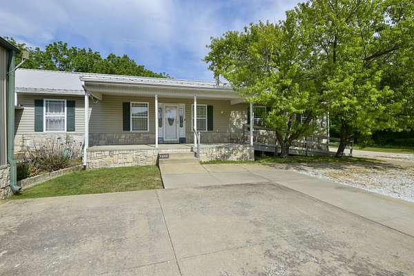 4.75 Acres of Land with Home for Sale in Strafford, Missouri