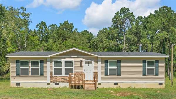 1.5 Acres of Residential Land with Home for Sale in St. Matthews, South Carolina