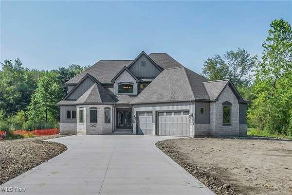 1.5 Acres of Residential Land with Home for Sale in Orange, Ohio