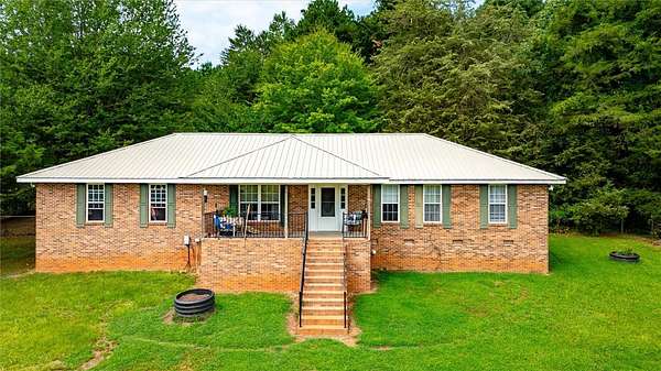 10 Acres of Land with Home for Sale in Seneca, South Carolina