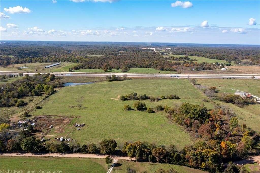 13.4 Acres of Improved Mixed-Use Land for Sale in Gravette, Arkansas