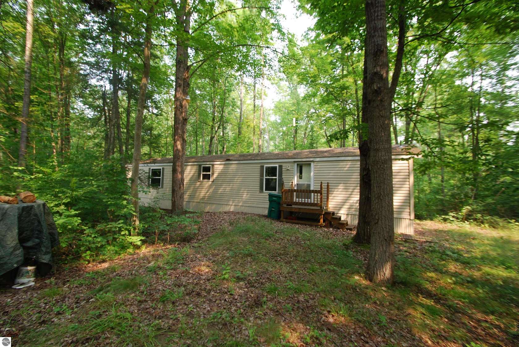 20 Acres of Recreational Land with Home for Sale in Beaverton, Michigan