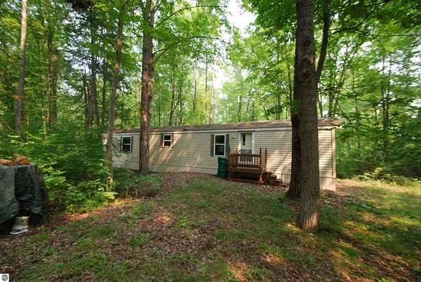 20 Acres of Recreational Land with Home for Sale in Beaverton, Michigan