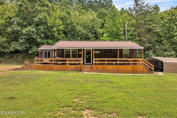 4 Acres of Residential Land with Home for Sale in Robbins, Tennessee