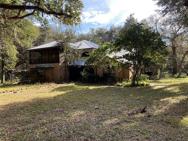 78 Acres of Land with Home for Sale in Lake Panasoffkee, Florida