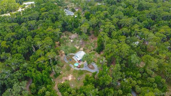 4.7 Acres of Land with Home for Sale in Crystal River, Florida