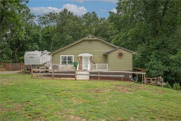 3.8 Acres of Residential Land with Home for Sale in Pineville, Missouri