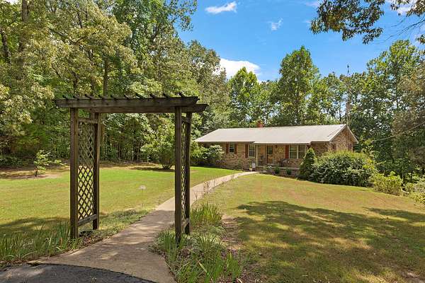 38.9 Acres of Recreational Land with Home for Sale in Paris, Tennessee