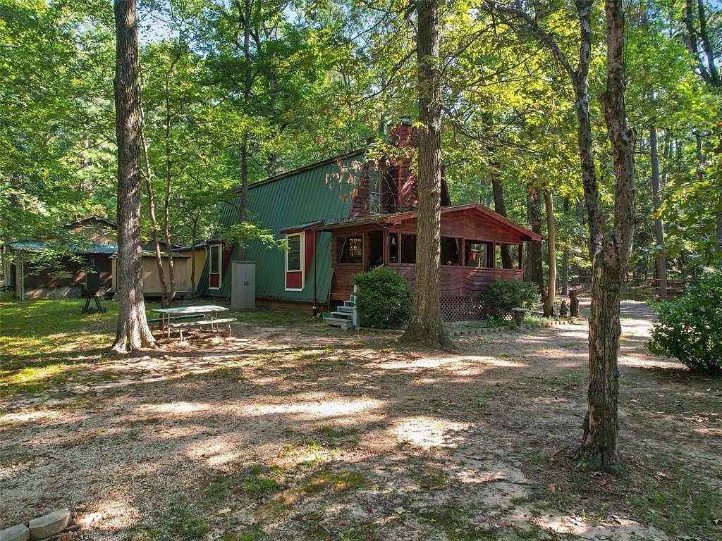 1.5 Acres of Residential Land with Home for Sale in Scroggins, Texas