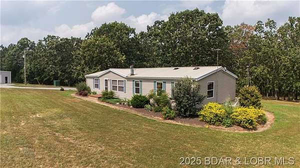 74 Acres of Land with Home for Sale in Edwards, Missouri