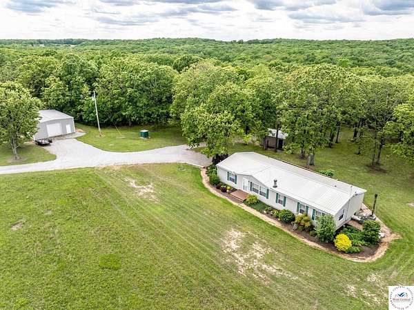 74 Acres of Land with Home for Sale in Edwards, Missouri