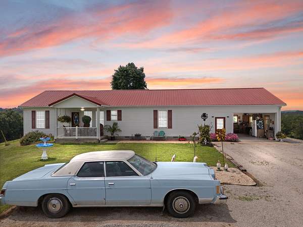 77 Acres of Land with Home for Sale in Morehead, Kentucky