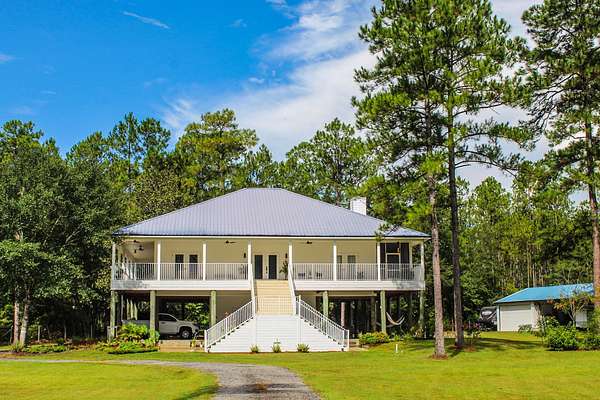 5.27 Acres of Residential Land with Home for Sale in Ponce de Leon, Florida