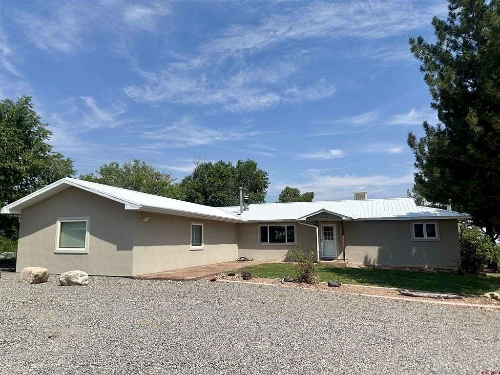 3.35 Acres of Residential Land with Home for Sale in Olathe, Colorado