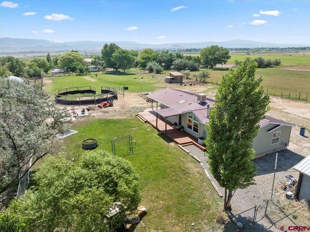 1.74 Acres of Residential Land with Home for Sale in Montrose, Colorado