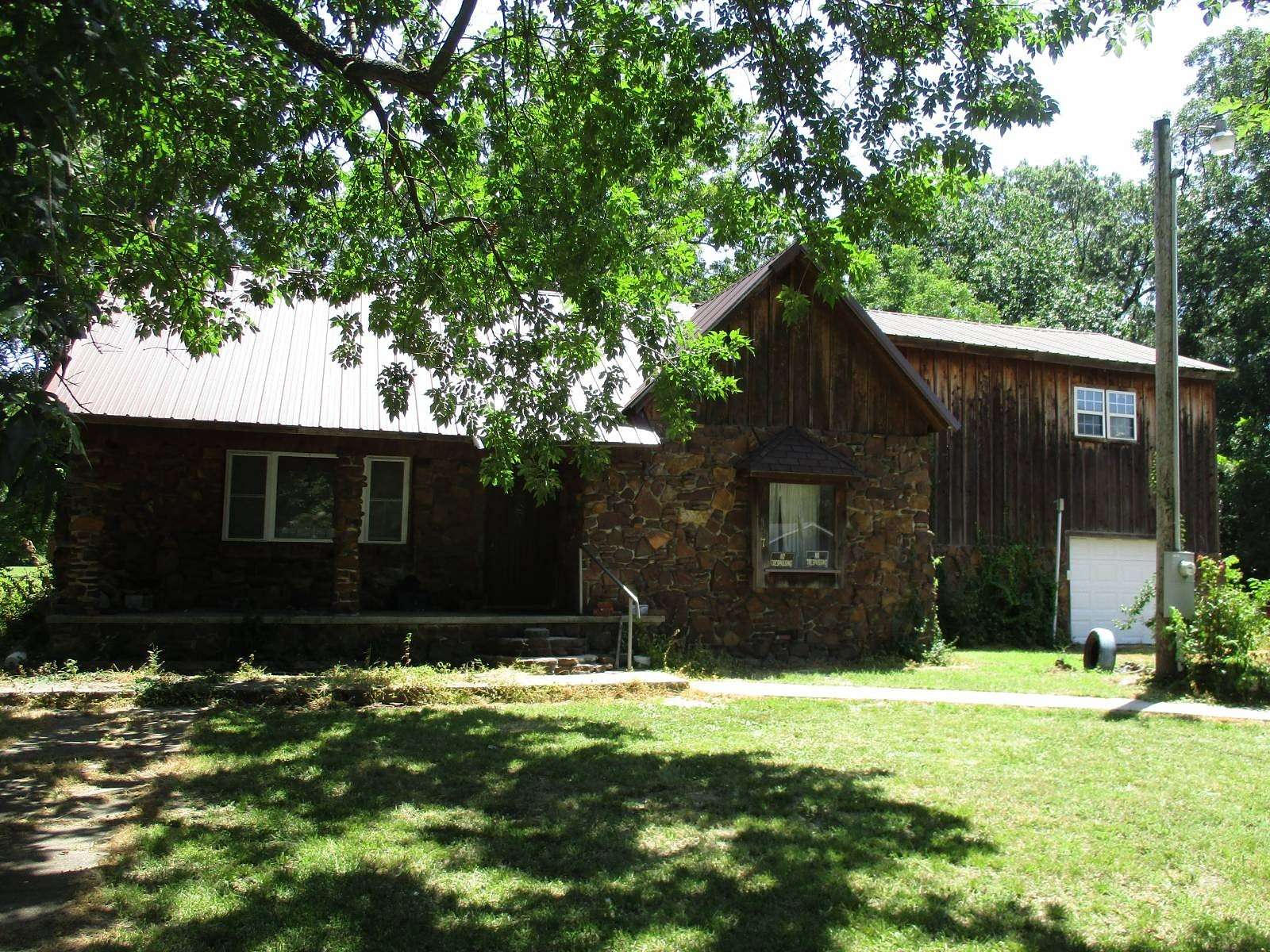 2.33 Acres of Residential Land with Home for Sale in Columbus, Kansas