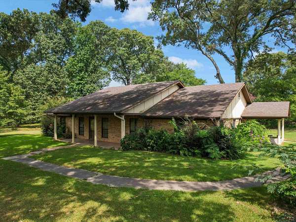 30 Acres of Land with Home for Sale in Daingerfield, Texas