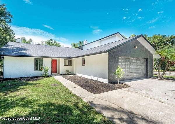 1.7 Acres of Residential Land with Home for Sale in Melbourne, Florida