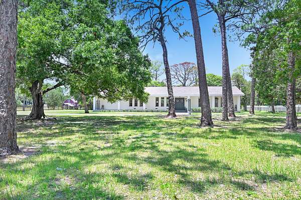 2.8 Acres of Residential Land with Home for Sale in Melbourne, Florida