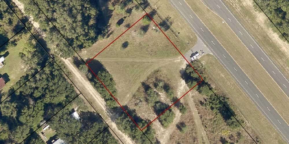 0.46 Acres of Commercial Land for Sale in Milton, Florida