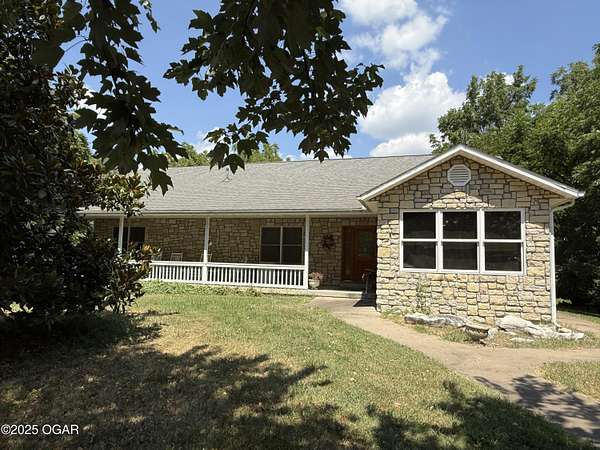 39 Acres of Agricultural Land with Home for Sale in Neosho, Missouri