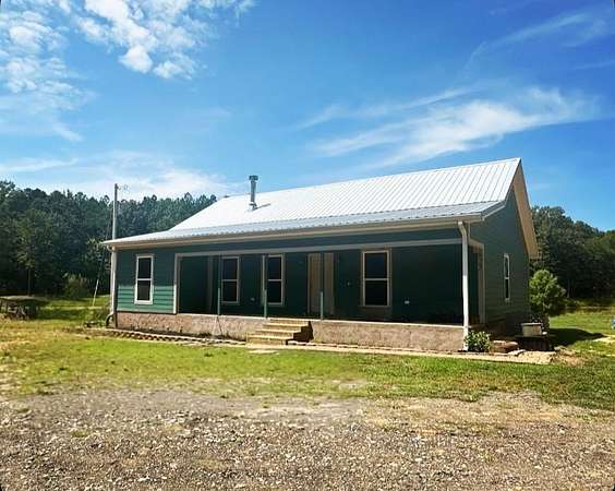 5.9 Acres of Residential Land with Home for Sale in Saltillo, Mississippi