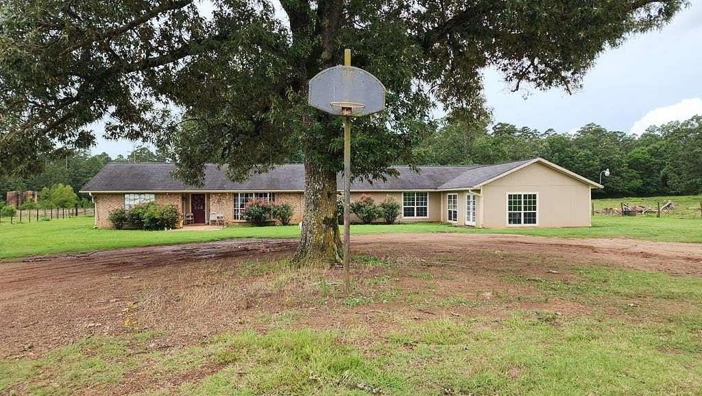 33 Acres of Agricultural Land with Home for Sale in Nacogdoches, Texas