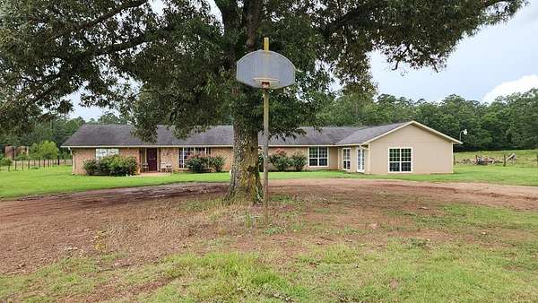 33 Acres of Agricultural Land with Home for Sale in Nacogdoches, Texas