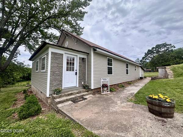 10 Acres of Land with Home for Sale in Sarcoxie, Missouri