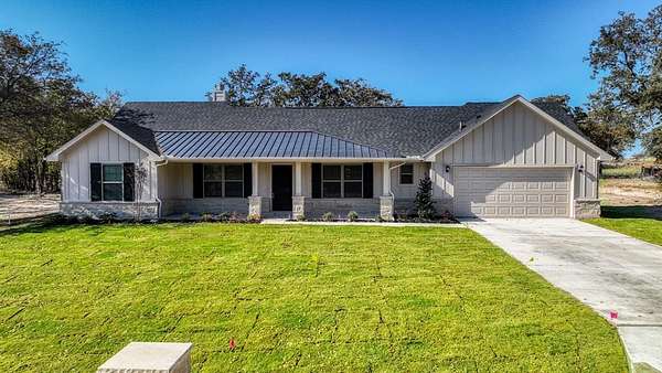 2 Acres of Residential Land with Home for Sale in Poolville, Texas