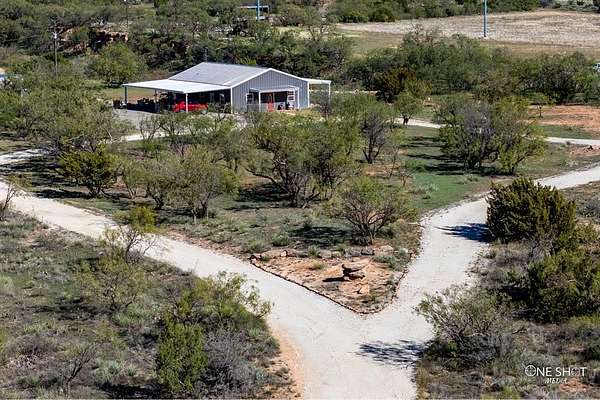 28.7 Acres of Agricultural Land with Home for Sale in Merkel, Texas