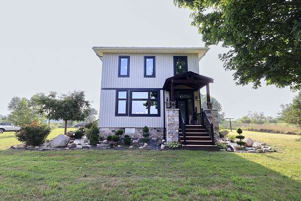 5 Acres of Residential Land with Home for Sale in Jones, Michigan