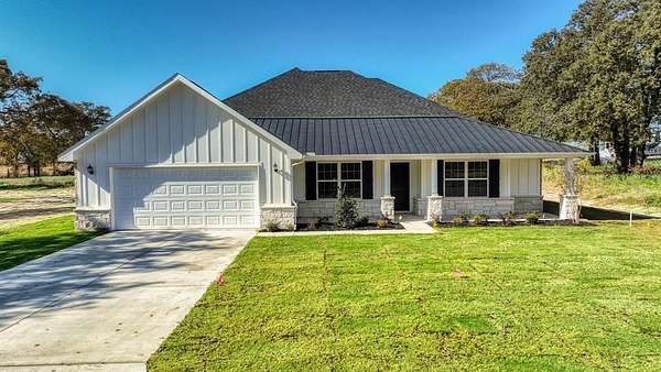 2 Acres of Residential Land with Home for Sale in Poolville, Texas