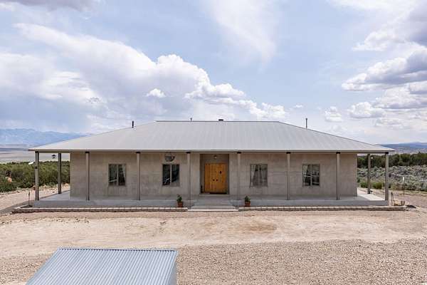 87.9 Acres of Recreational Land with Home for Sale in Spring Creek, Nevada