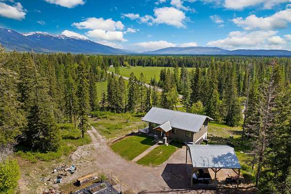 5 Acres of Residential Land with Home for Sale in Kalispell, Montana