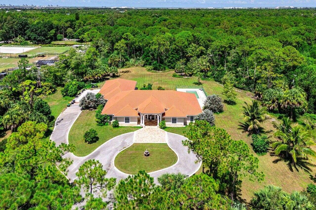 5 Acres of Residential Land with Home for Sale in Loxahatchee Groves, Florida