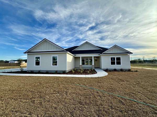 2 Acres of Residential Land with Home for Sale in Crawfordville, Florida