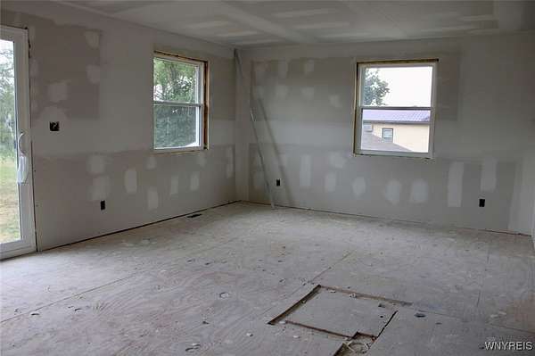 4.2 Acres of Residential Land with Home for Sale in Medina, New York