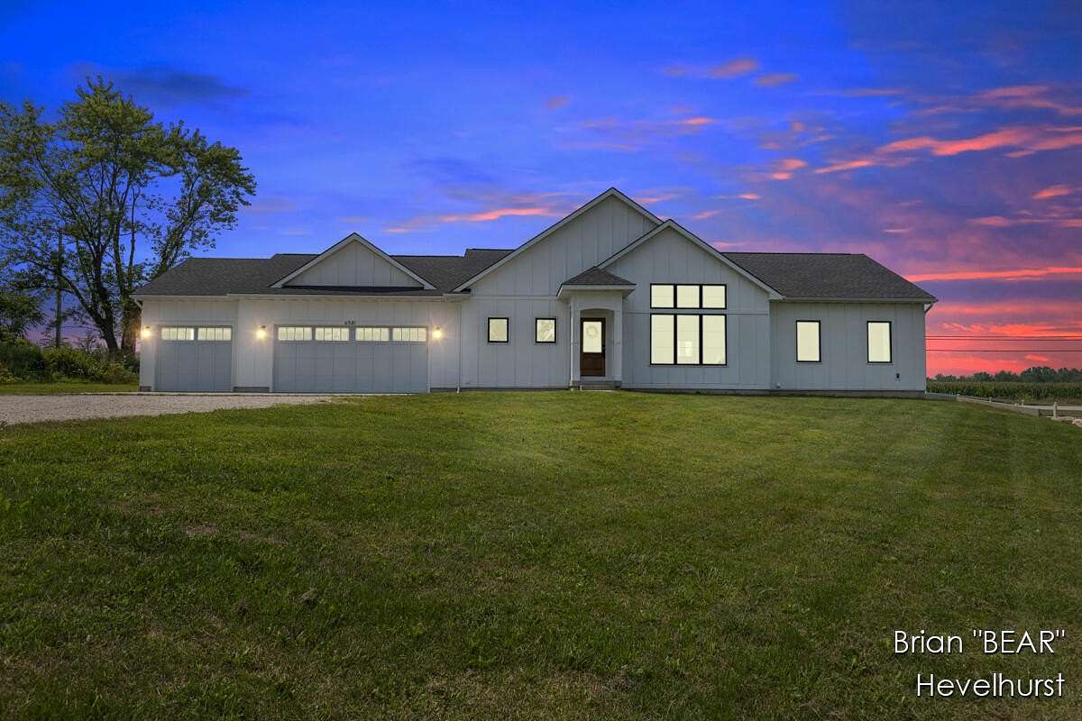 2.5 Acres of Residential Land with Home for Sale in Alto, Michigan