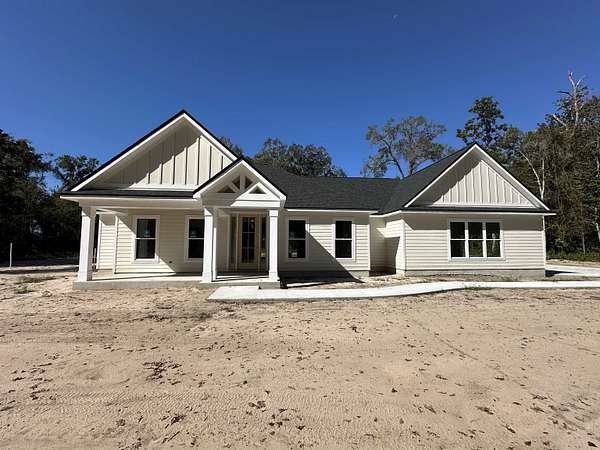 5 Acres of Residential Land with Home for Sale in Crawfordville, Florida