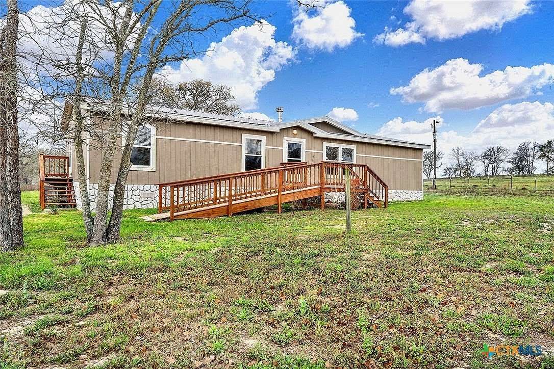 17.7 Acres of Land with Home for Sale in Stockdale, Texas