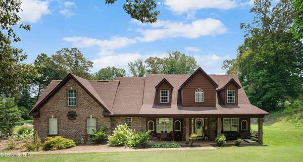 1.5 Acres of Residential Land with Home for Sale in Lake Cormorant, Mississippi